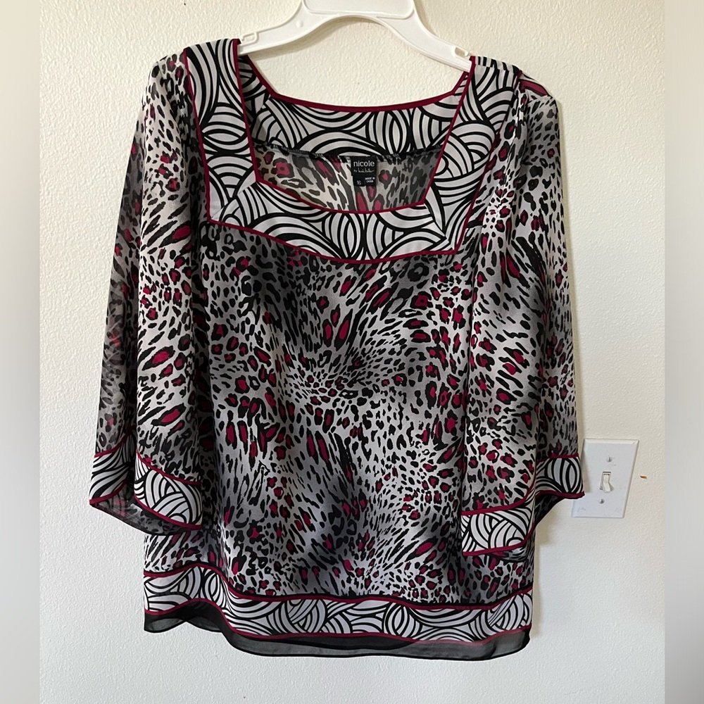 Beautiful black printed blouse by Nicole